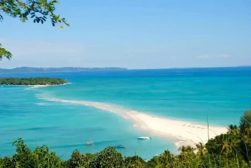 Nosy Iranja Madagascar tropical island with white sandy beach and clear blue water